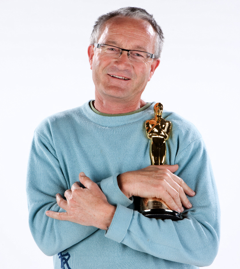 Kim Sinclair with his Oscar for Best Art Production